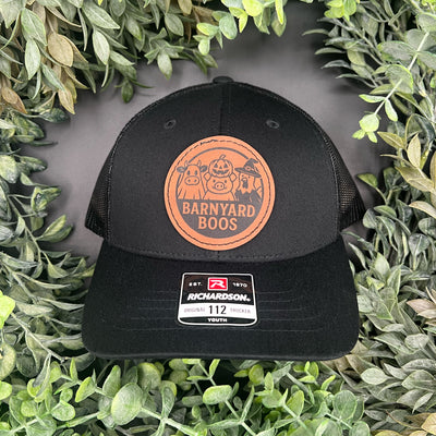 Hat with patch engraved with animals in costumes that says "Barnyard Boos"