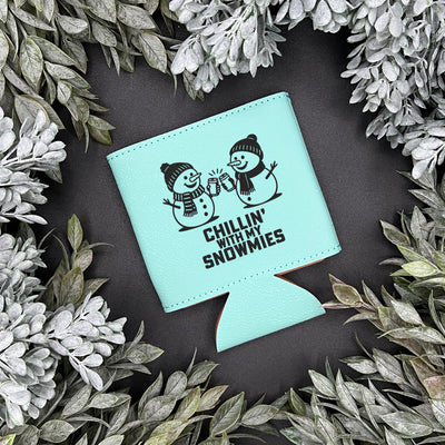 Teal can koozie engraved with two snowmen and the phrase "chillin with my snowmies"