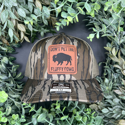 Don't Pet the Fluffy Cows laser engraved leatherette patch hat on the Richardson 112 Mossy Oak Bottomland/Loden.