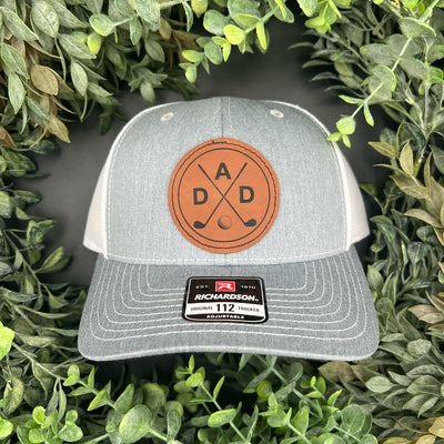 Engraved leatherette patch with engraved golf dad design.